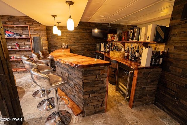 bar with decorative light fixtures