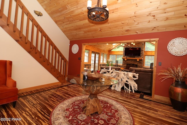 interior space with lofted ceiling, wood ceiling, and a fireplace