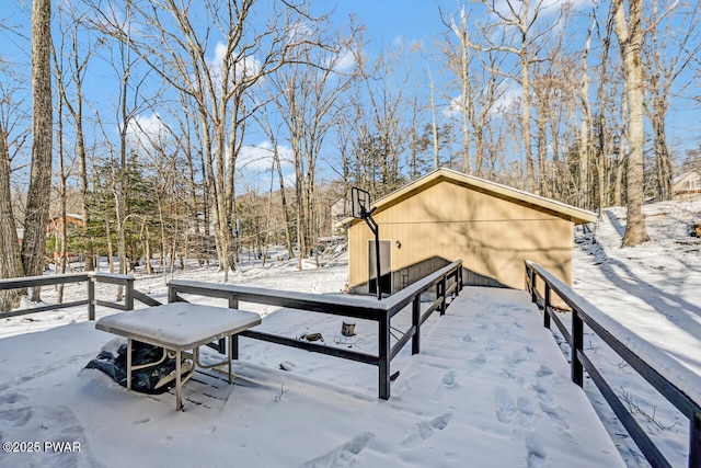 view of snow covered deck