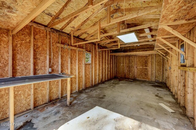 miscellaneous room with vaulted ceiling