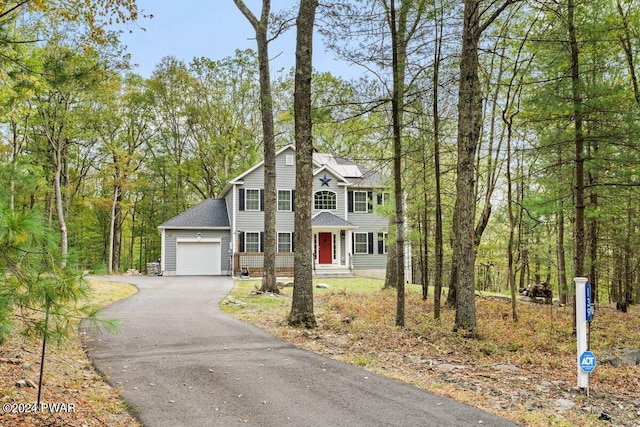 view of front of property featuring a garage