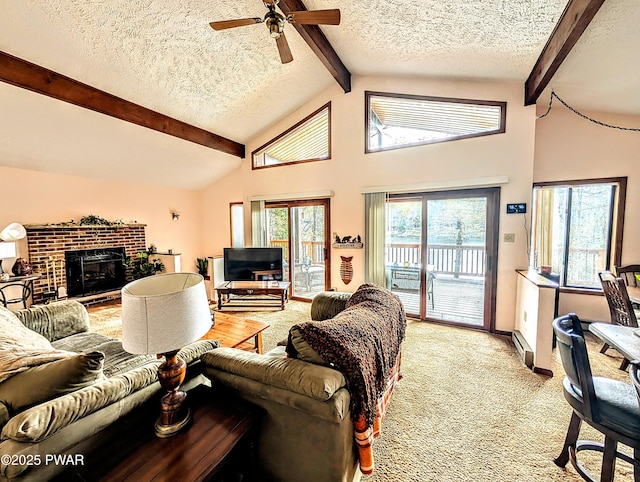 living area with light colored carpet, a brick fireplace, a textured ceiling, a ceiling fan, and beamed ceiling