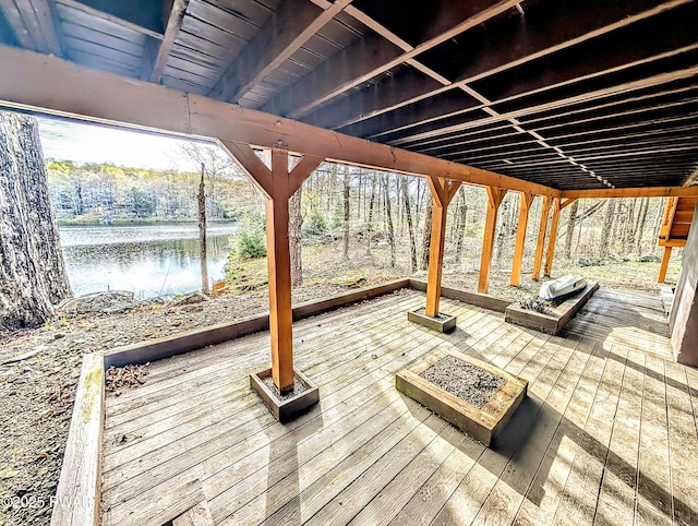 wooden terrace with a water view