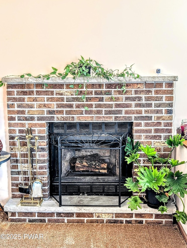 room details featuring a fireplace