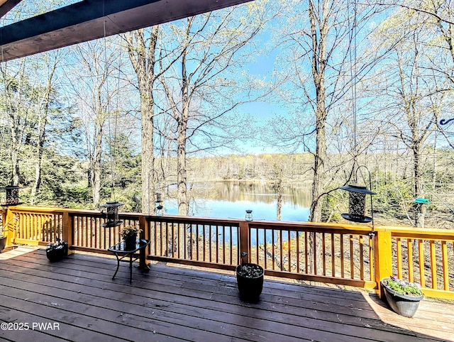 deck featuring a water view