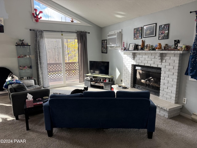 living room with a textured ceiling, a fireplace, carpet, and lofted ceiling