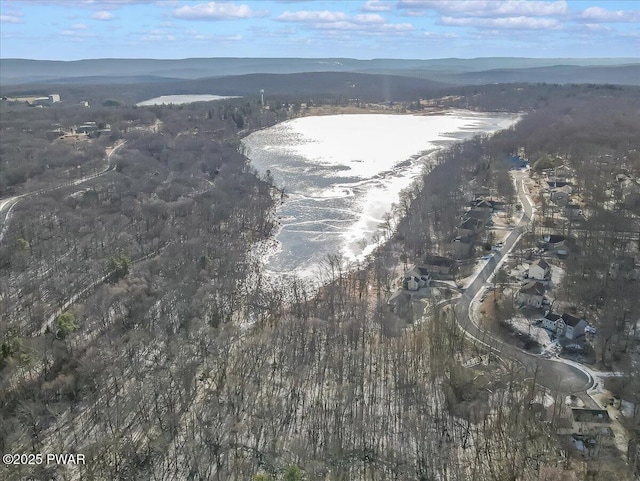 drone / aerial view featuring a mountain view