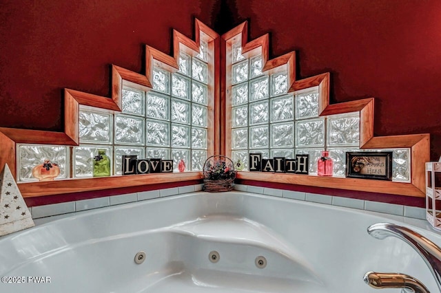 full bath featuring a whirlpool tub