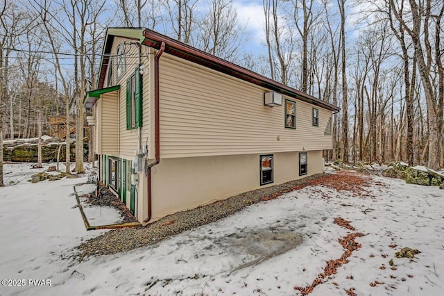 view of snow covered property