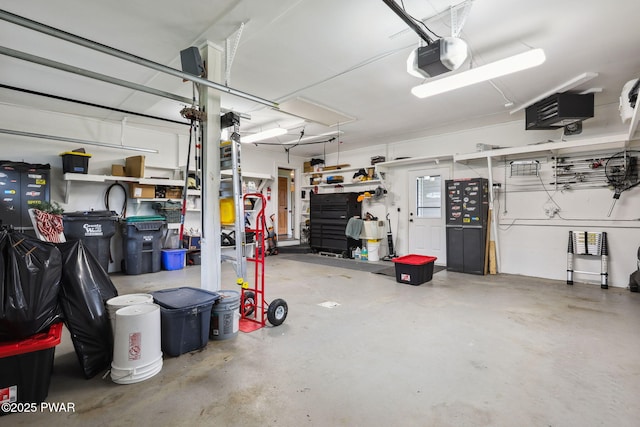 198 State Route 690, Springbrook Township, PA 18444 - garage featuring a garage door opener and a heating unit