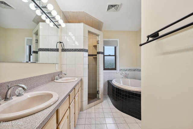 198 State Route 690, Springbrook Township, PA 18444 - bathroom featuring a stall shower, a bath, double vanity, and tile patterned flooring