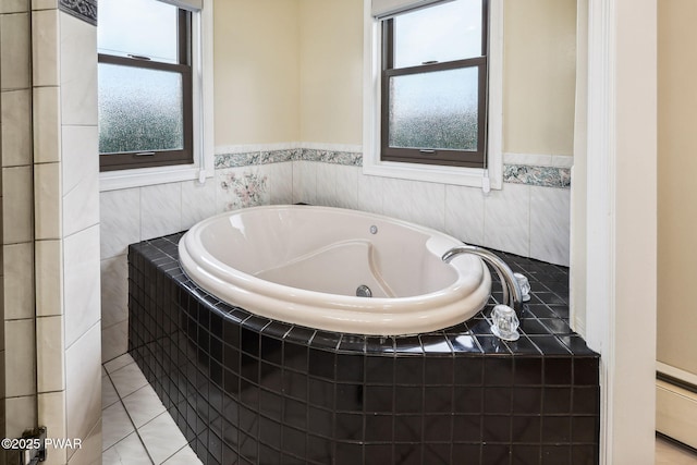 198 State Route 690, Springbrook Township, PA 18444 - bathroom with a garden tub and tile patterned flooring