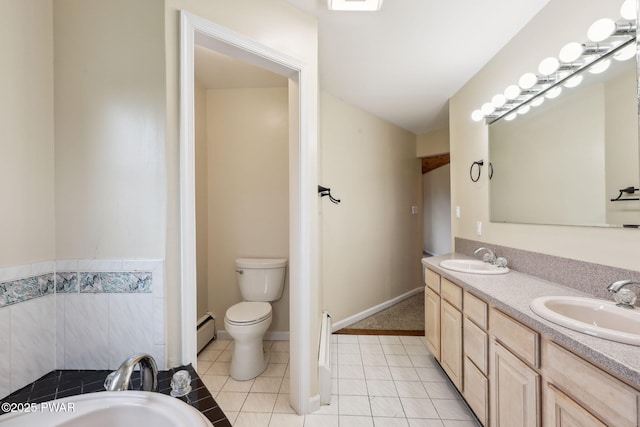 198 State Route 690, Springbrook Township, PA 18444 - bathroom with a baseboard radiator, double vanity, tile patterned floors, and a tub