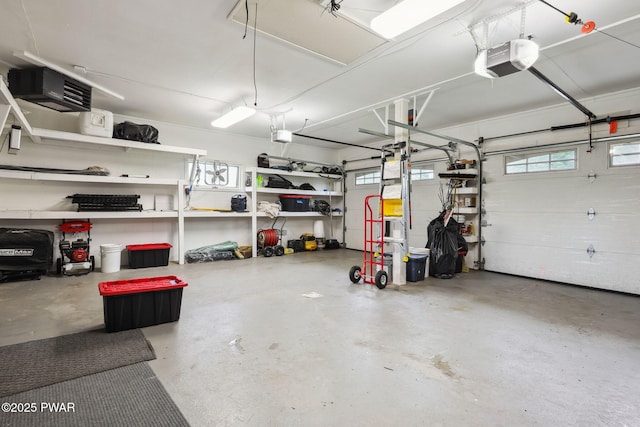 198 State Route 690, Springbrook Township, PA 18444 - garage featuring a garage door opener