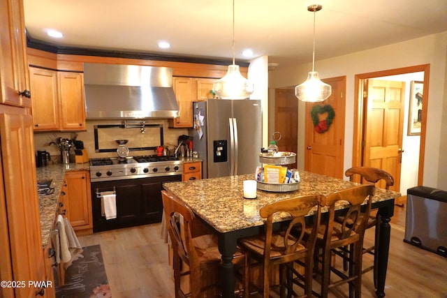 103 Valley Forge Rd, Milford, PA 18337 - kitchen with wall chimney exhaust hood, stainless steel appliances, light wood-type flooring, light stone countertops, and recessed lighting