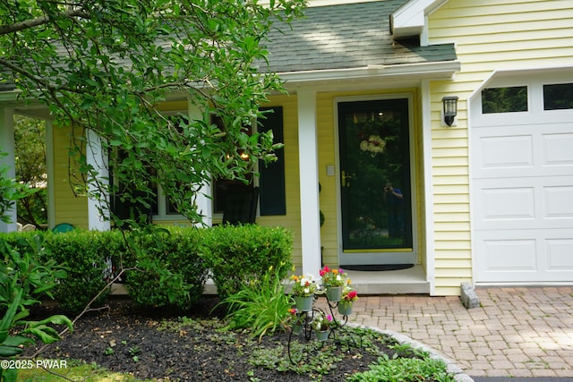 103 Valley Forge Rd, Milford, PA 18337 - entrance to property featuring roof with shingles and a garage