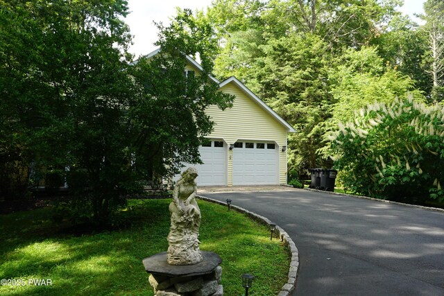 103 Valley Forge Rd, Milford, PA 18337 - view of front of house featuring asphalt driveway and a garage