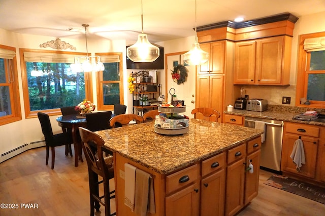 103 Valley Forge Rd, Milford, PA 18337 - kitchen with dishwasher, light wood finished floors, a center island, stone counters, and decorative light fixtures