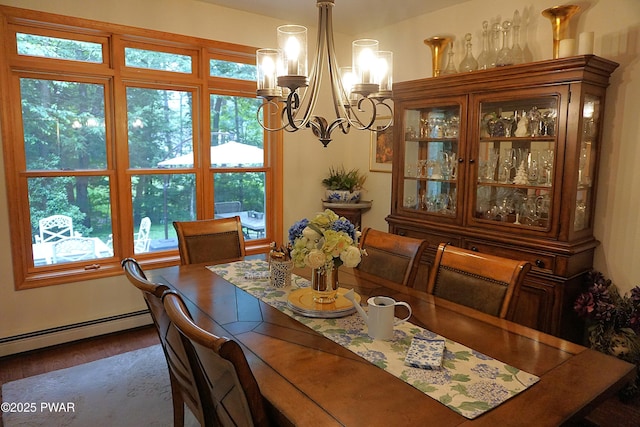 103 Valley Forge Rd, Milford, PA 18337 - dining area with a chandelier, a baseboard heating unit, plenty of natural light, and dark wood finished floors