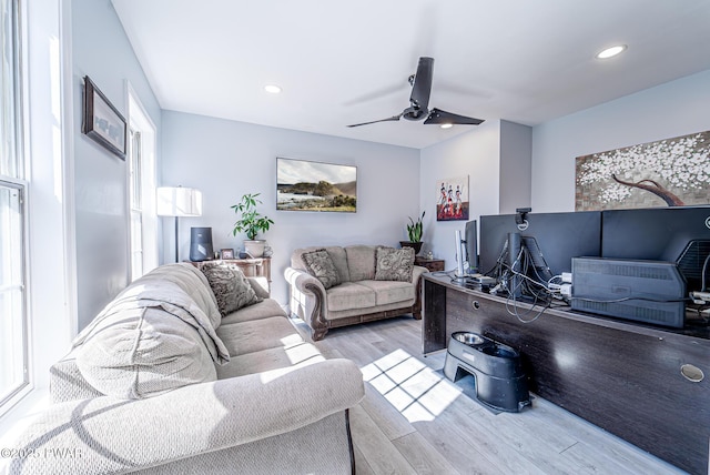 living room featuring ceiling fan, wood finished floors, and recessed lighting