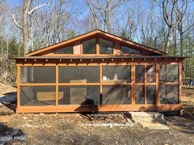 exterior space with a sunroom