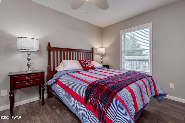 bedroom featuring ceiling fan and dark hardwood / wood-style flooring