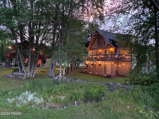 view of yard featuring a wooden deck