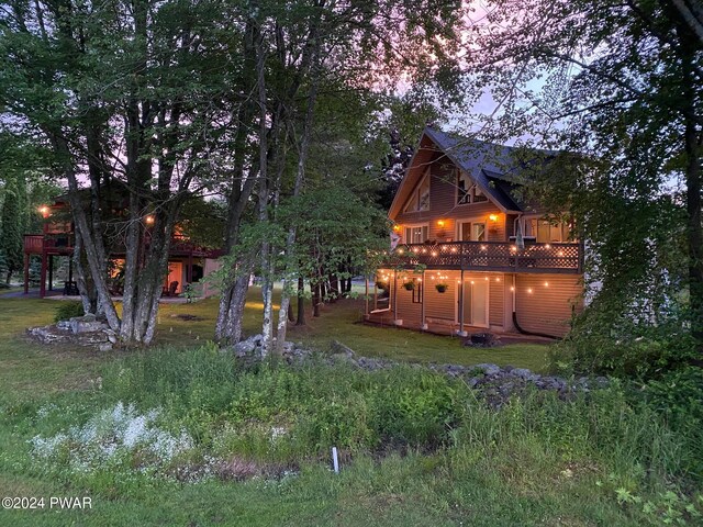 view of yard featuring a wooden deck