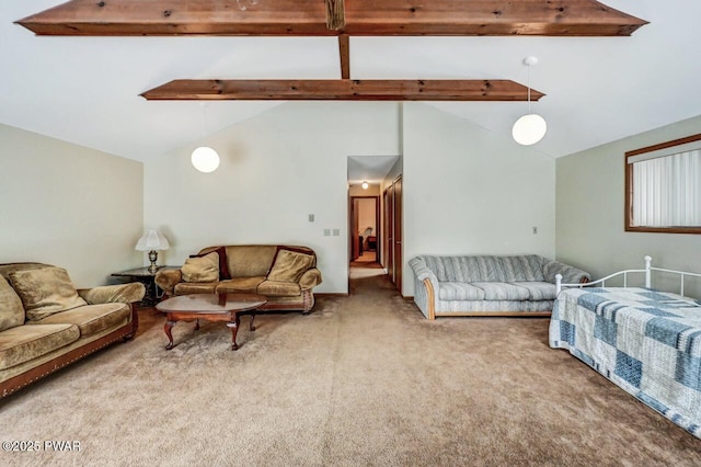 carpeted living room featuring beam ceiling and high vaulted ceiling