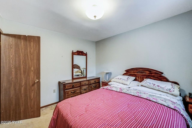 bedroom with light carpet