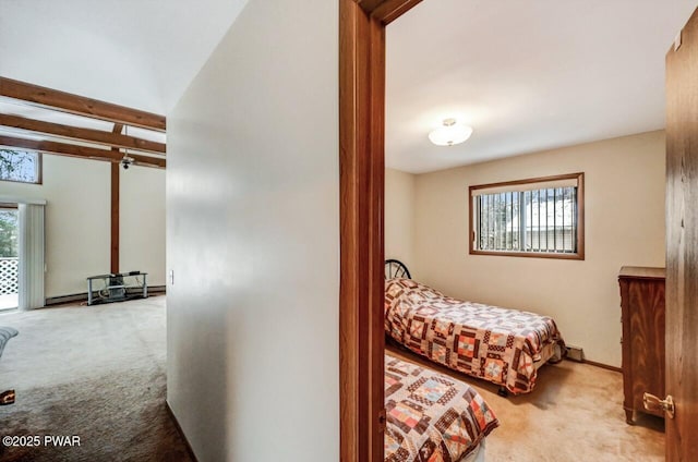 bedroom featuring light carpet