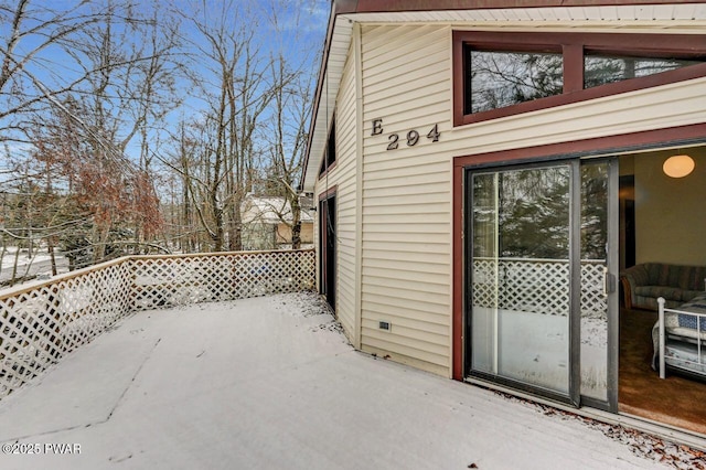 view of snow covered patio