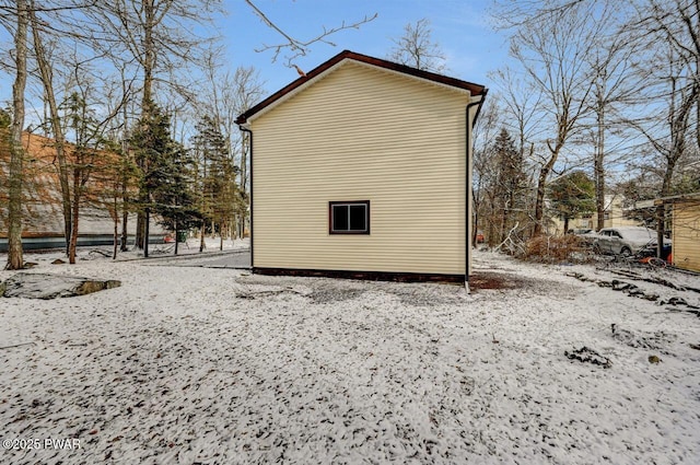 view of snow covered property