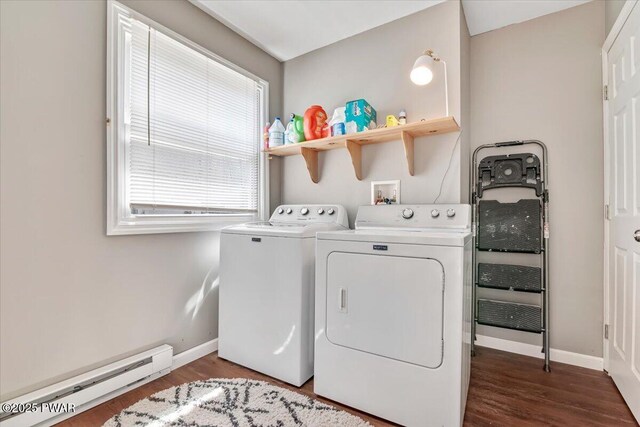 laundry room with baseboard heating, baseboards, laundry area, and independent washer and dryer