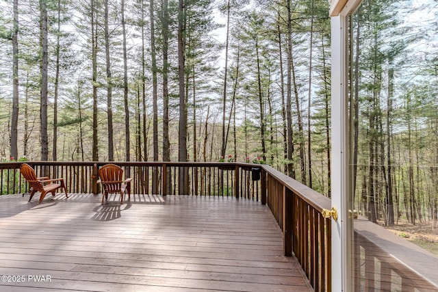117 Circle Dr, Hawley, PA 18428 - deck featuring a wooded view