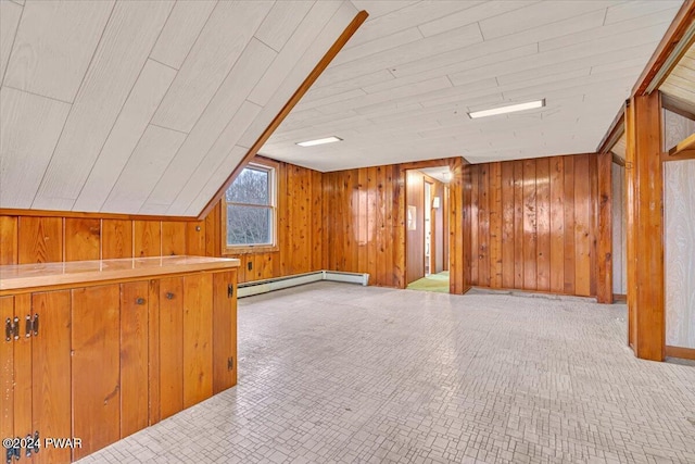 bonus room featuring a baseboard radiator, vaulted ceiling, wooden walls, and wood ceiling