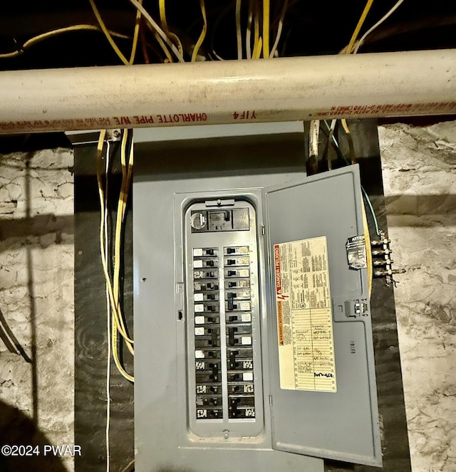 utility room featuring electric panel