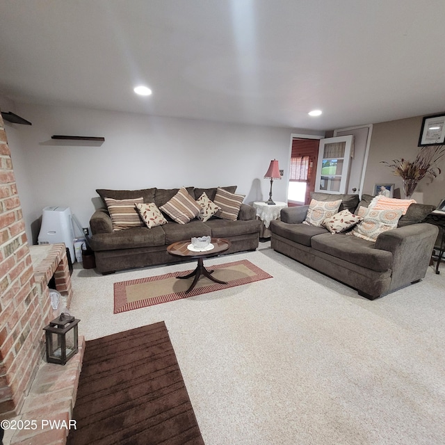 117 W Shore Dr, Dingmans Ferry, PA 18328 - living area featuring carpet, a brick fireplace, and recessed lighting