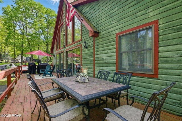 173 Paper Birch S, Tafton, PA 18464 - wooden deck featuring outdoor dining area