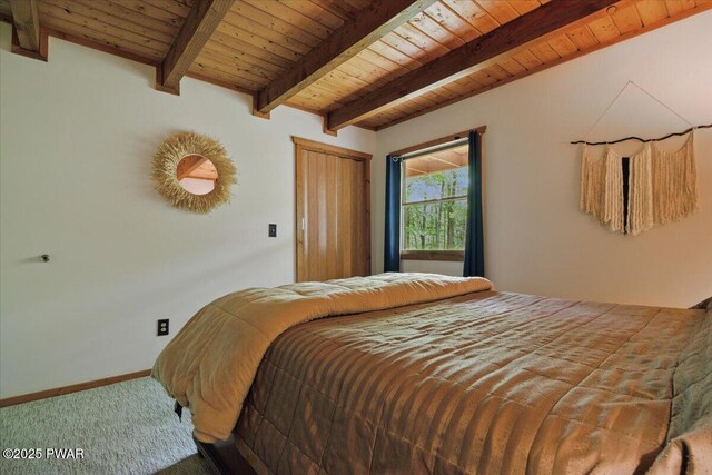 173 Paper Birch S, Tafton, PA 18464 - bedroom featuring wood ceiling with exposed beams, carpet floors, and baseboards