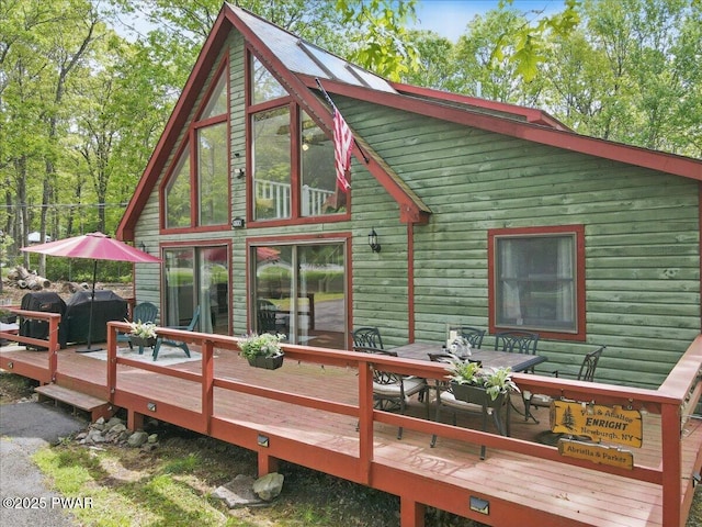 173 Paper Birch S, Tafton, PA 18464 - rear view of house with a deck and outdoor dining space