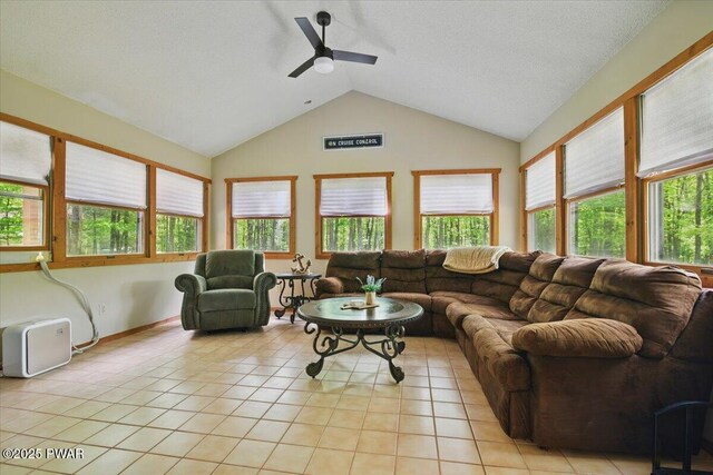173 Paper Birch S, Tafton, PA 18464 - living room with vaulted ceiling, a ceiling fan, and light tile patterned floors