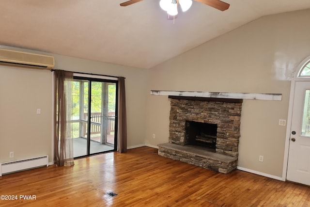 unfurnished living room featuring a wall mounted air conditioner, vaulted ceiling, ceiling fan, light wood-type flooring, and baseboard heating