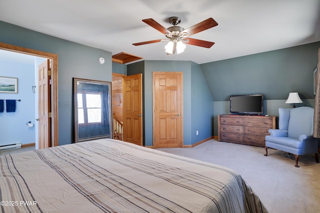 carpeted bedroom with baseboards, baseboard heating, and ceiling fan