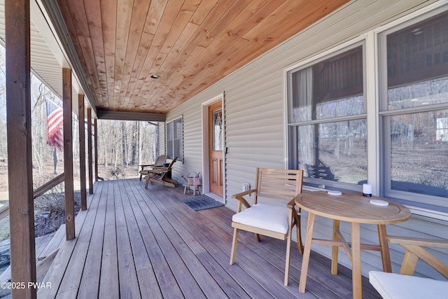 wooden terrace featuring a porch