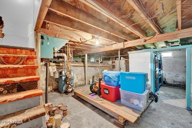 below grade area with a heating unit