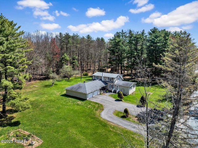 bird's eye view with a forest view