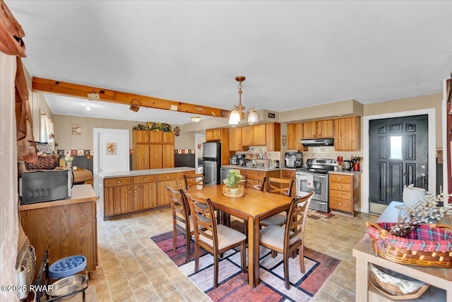 dining space featuring beamed ceiling, a notable chandelier, and stone finish flooring