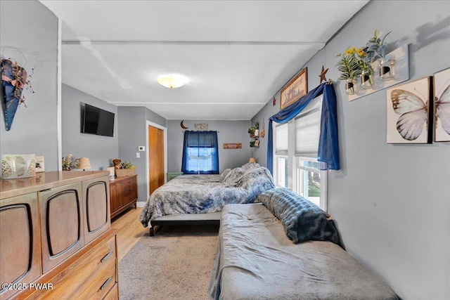 bedroom featuring light wood-style flooring