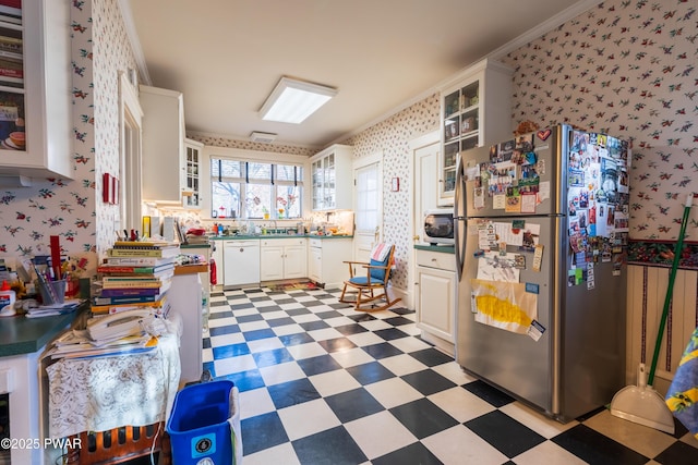 kitchen featuring stainless steel fridge, white dishwasher, white cabinetry, and ornamental molding